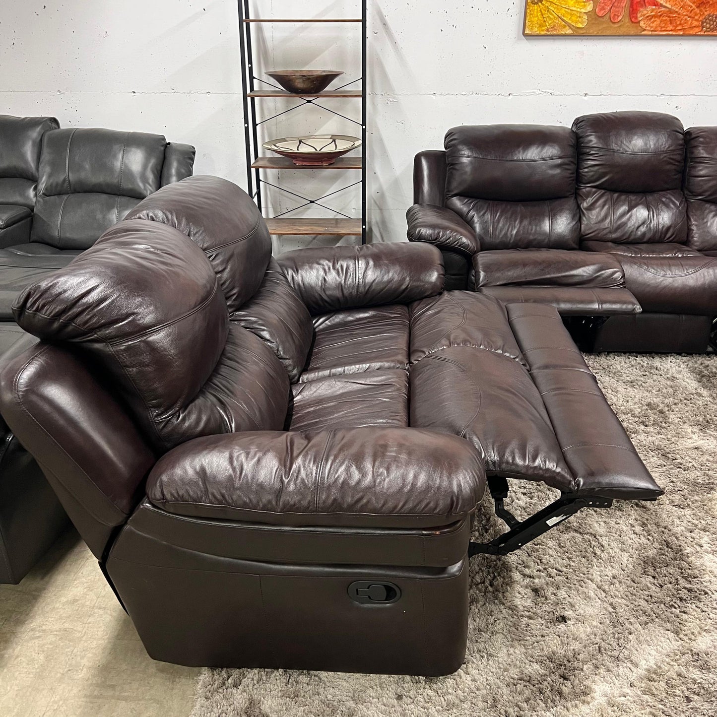 Real leather Reclining sofa set.