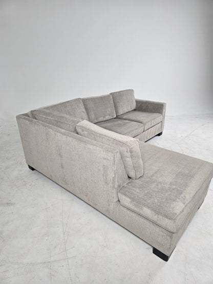 Stylus custom made sectional. Beige L shaped sofa couch.