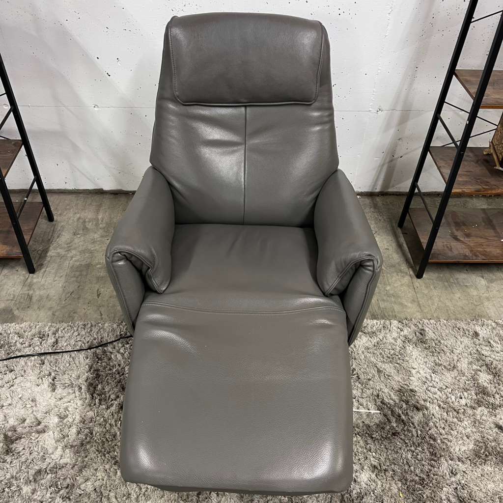 Power leather reclining chair. Real leather armchair.