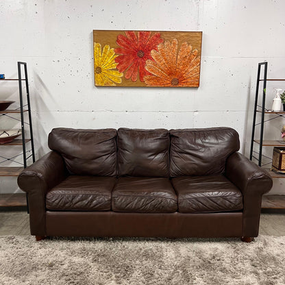 Leather pull out sofa bed.