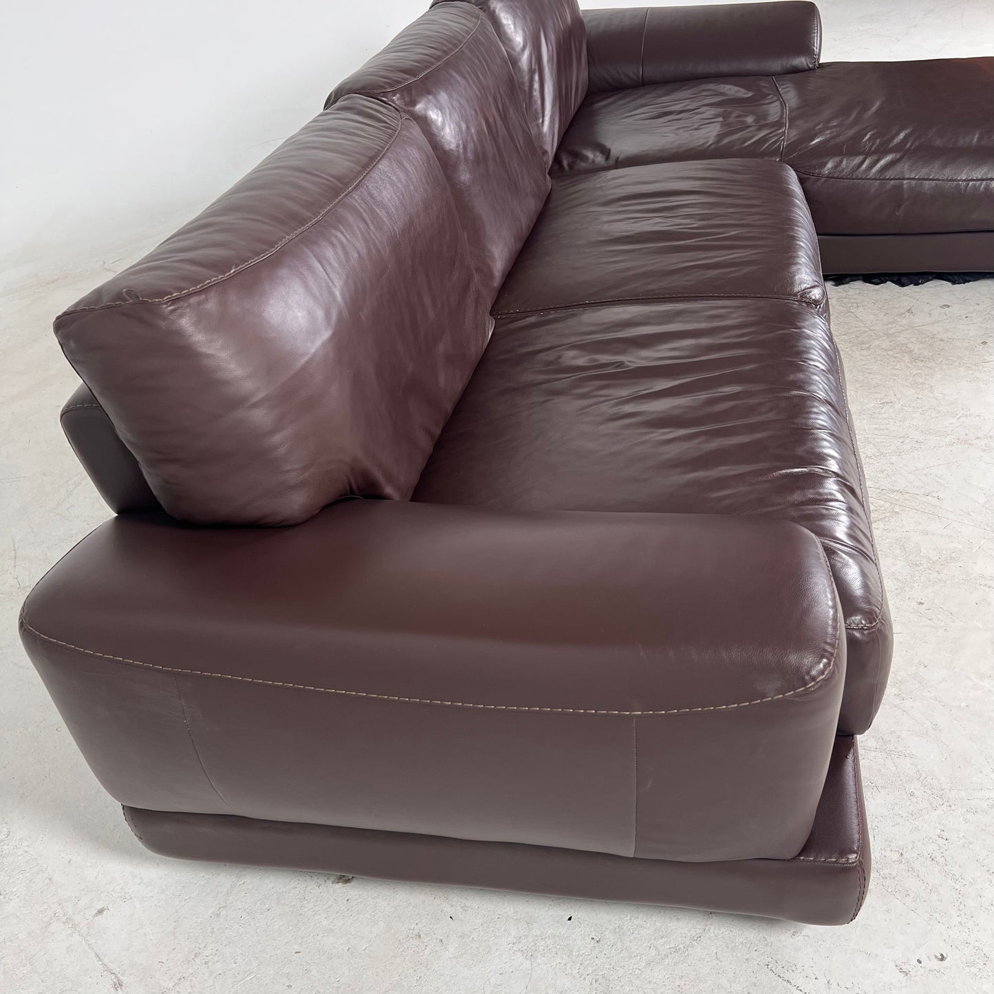 Genuine high end brown leather sectional. L Shaped sofa couch
