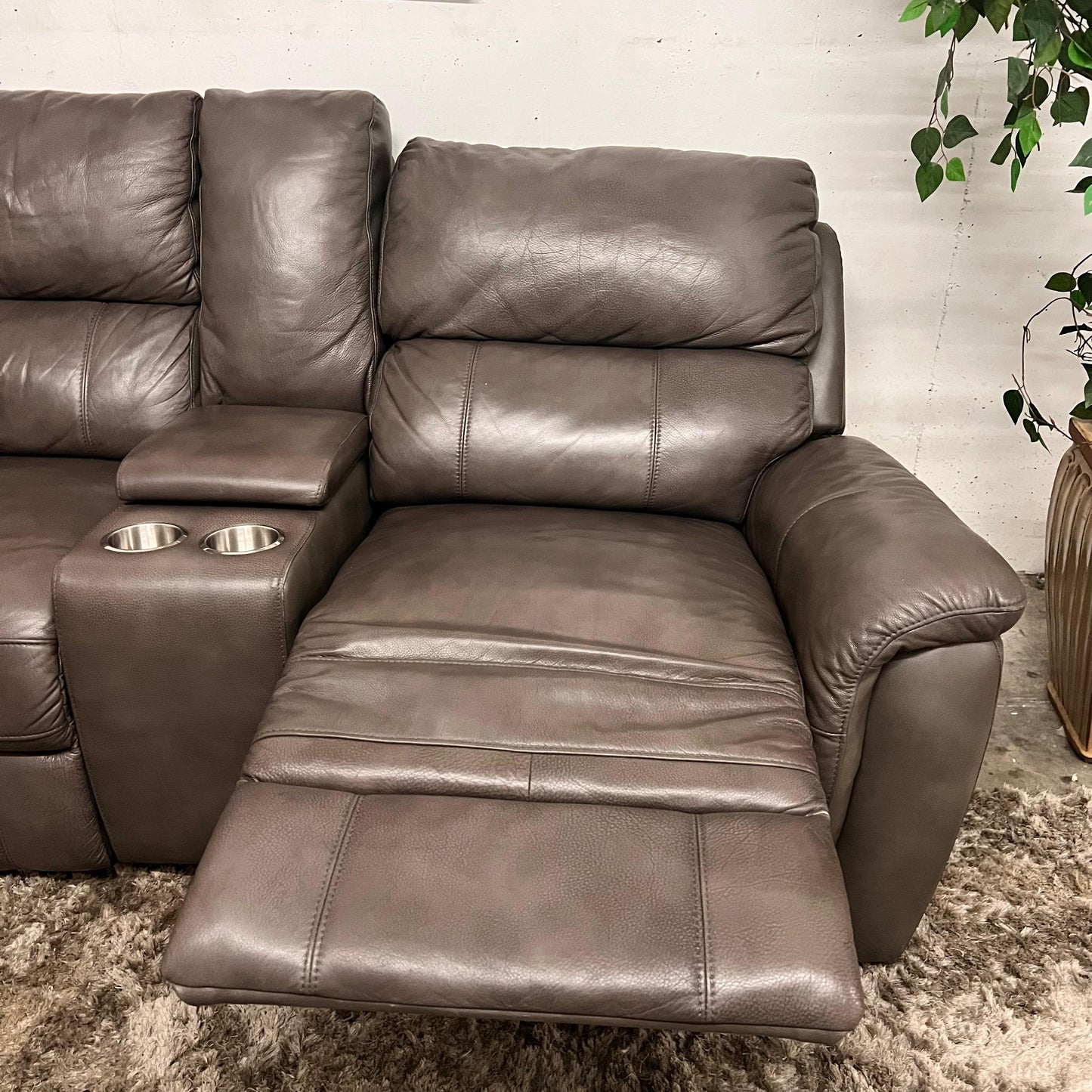 Leather reclining sectional. Power recliners