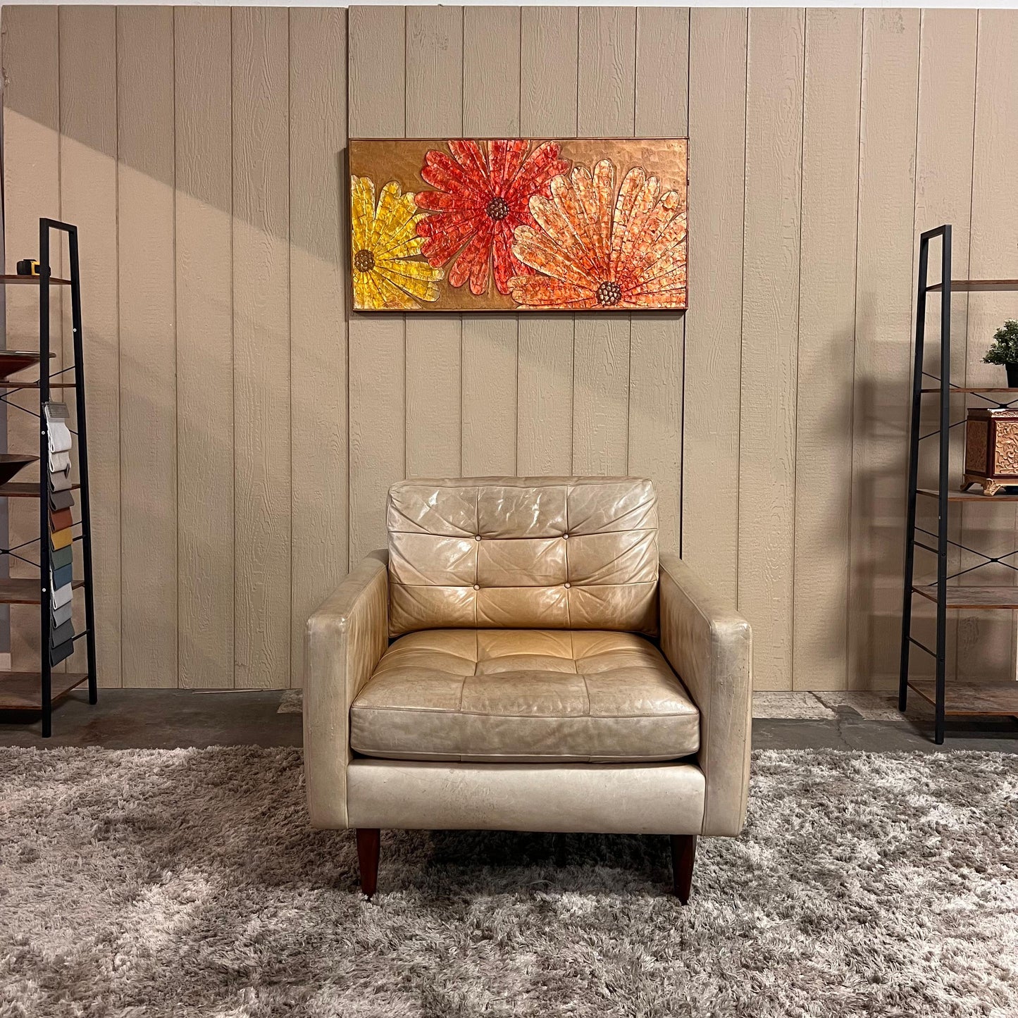 Crate and barrel caramel leather chair.