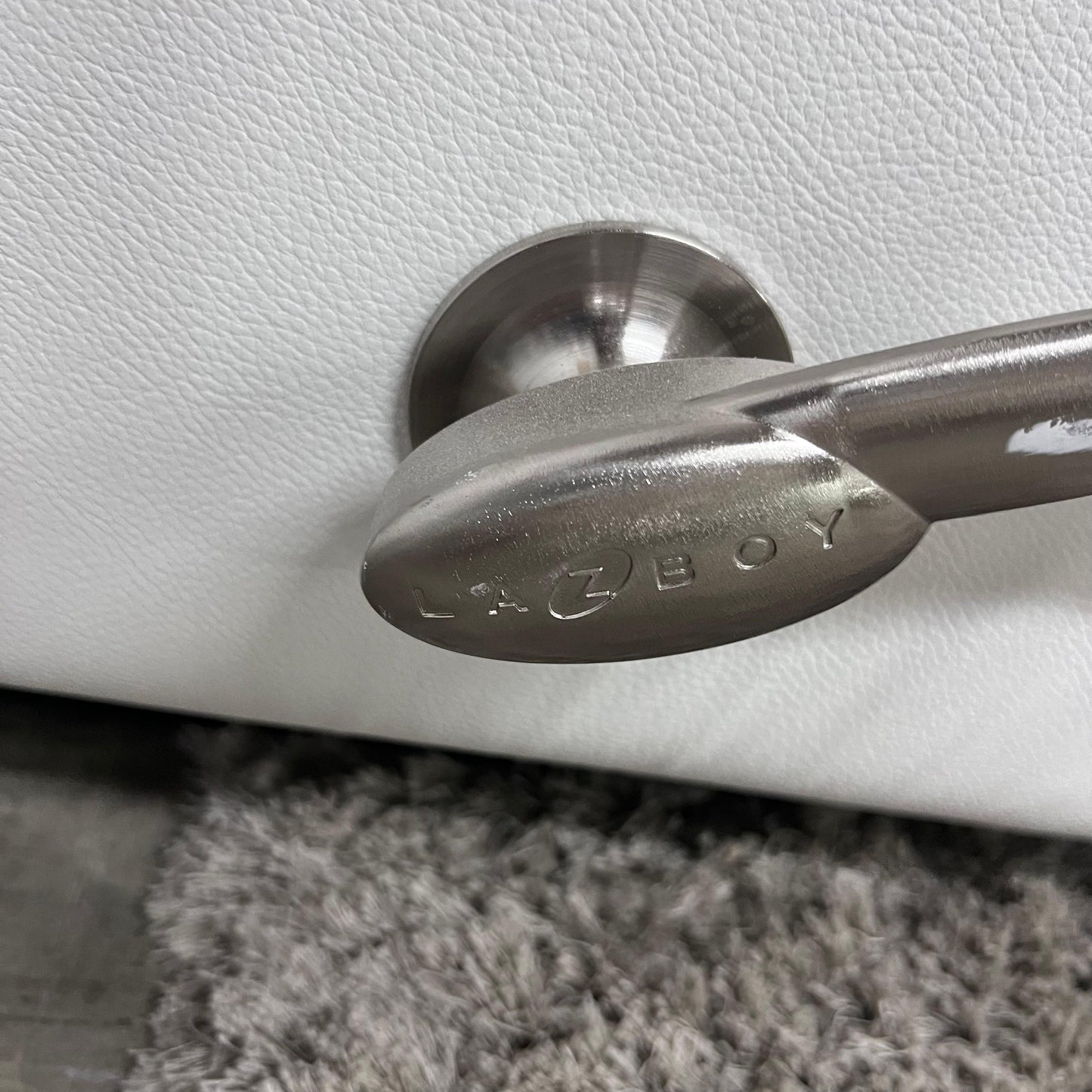 La z boy genuine recliner. White leather reclining chair.