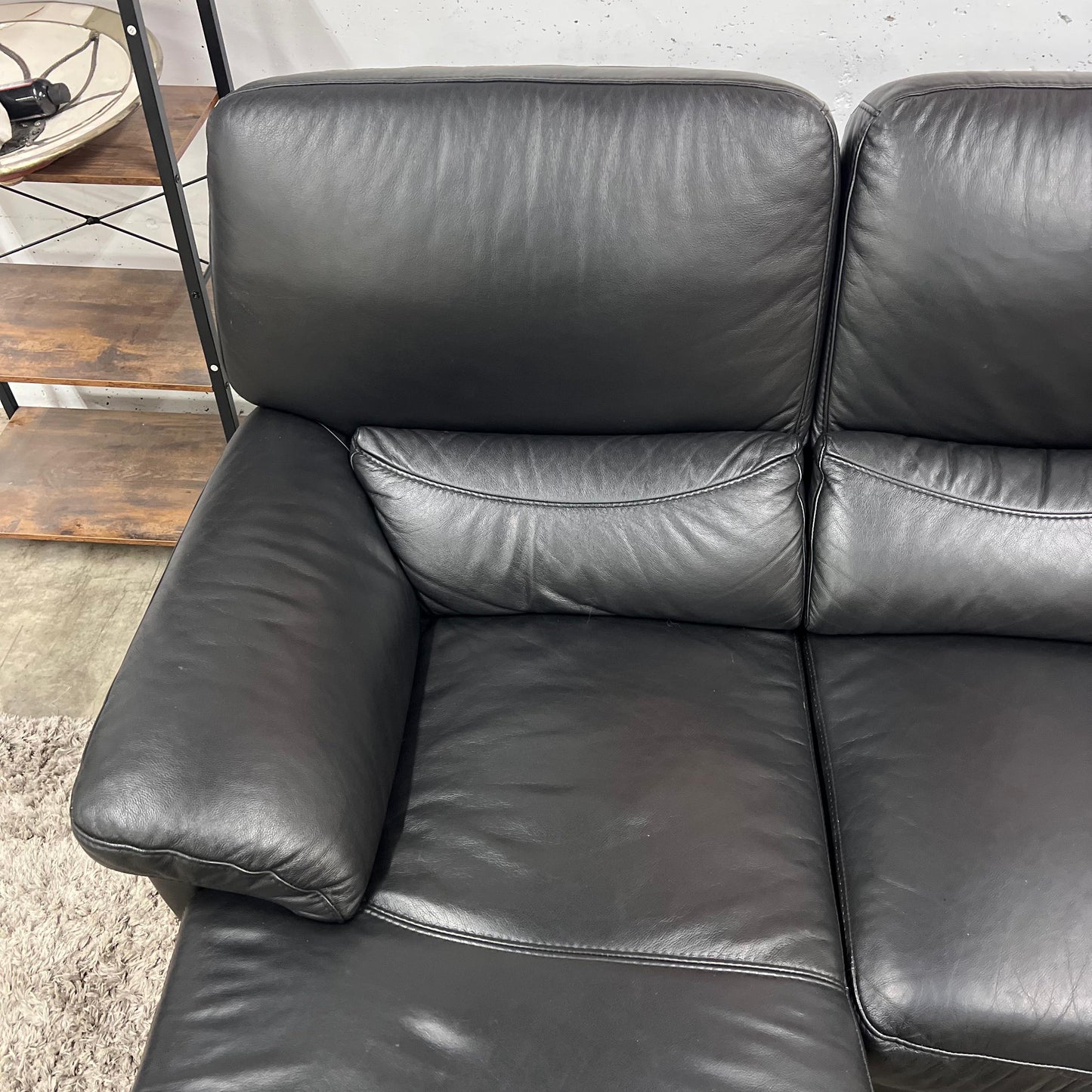 Black leather sectional. L shaped sofa couch. Delivery available