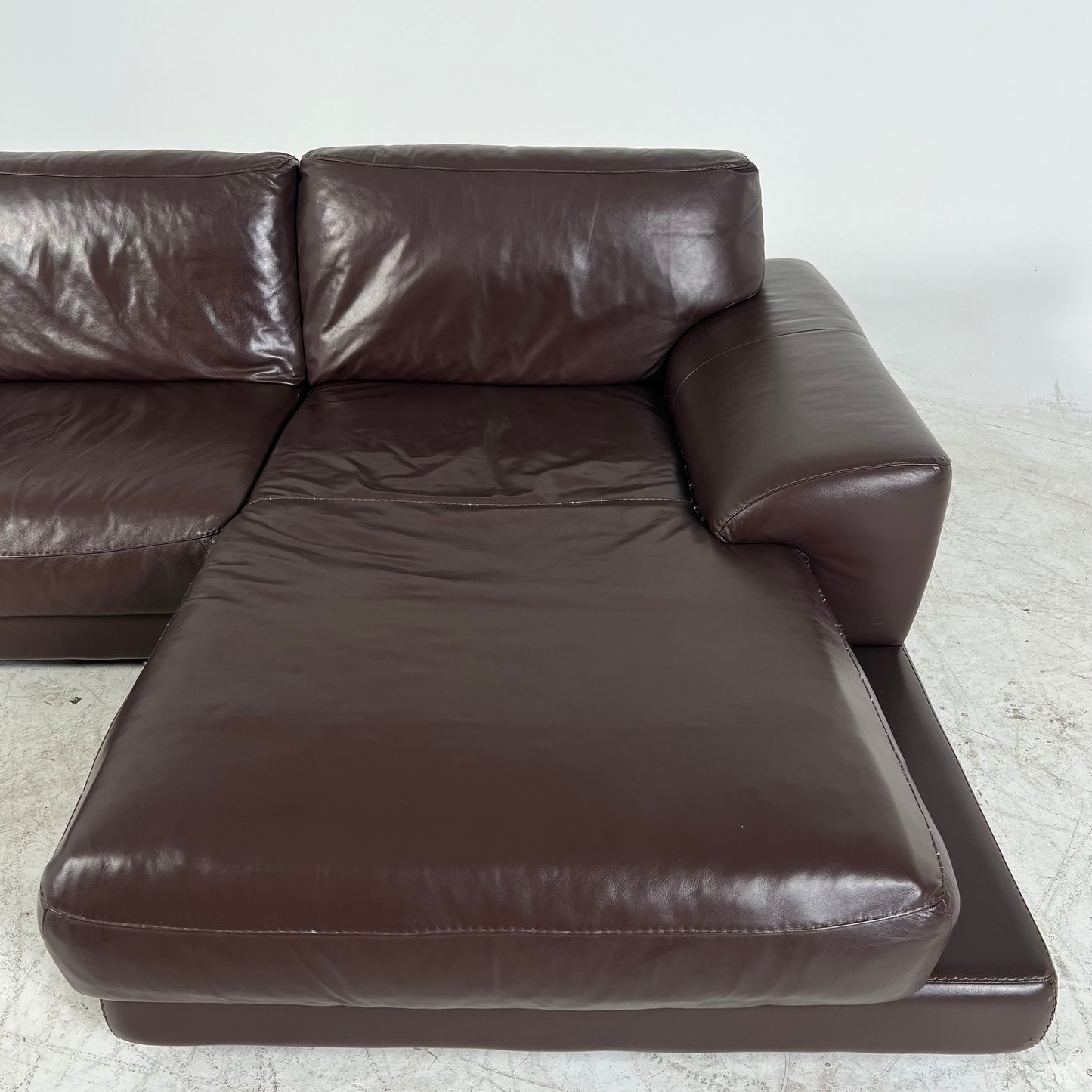 Genuine high end brown leather sectional. L Shaped sofa couch