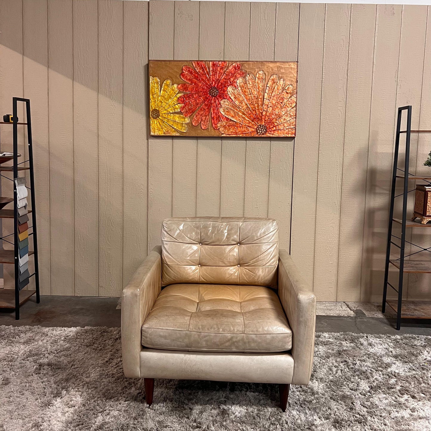 Crate and barrel caramel leather chair.