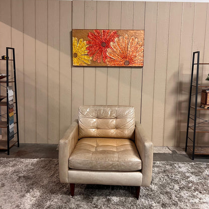 Crate and barrel caramel leather chair.
