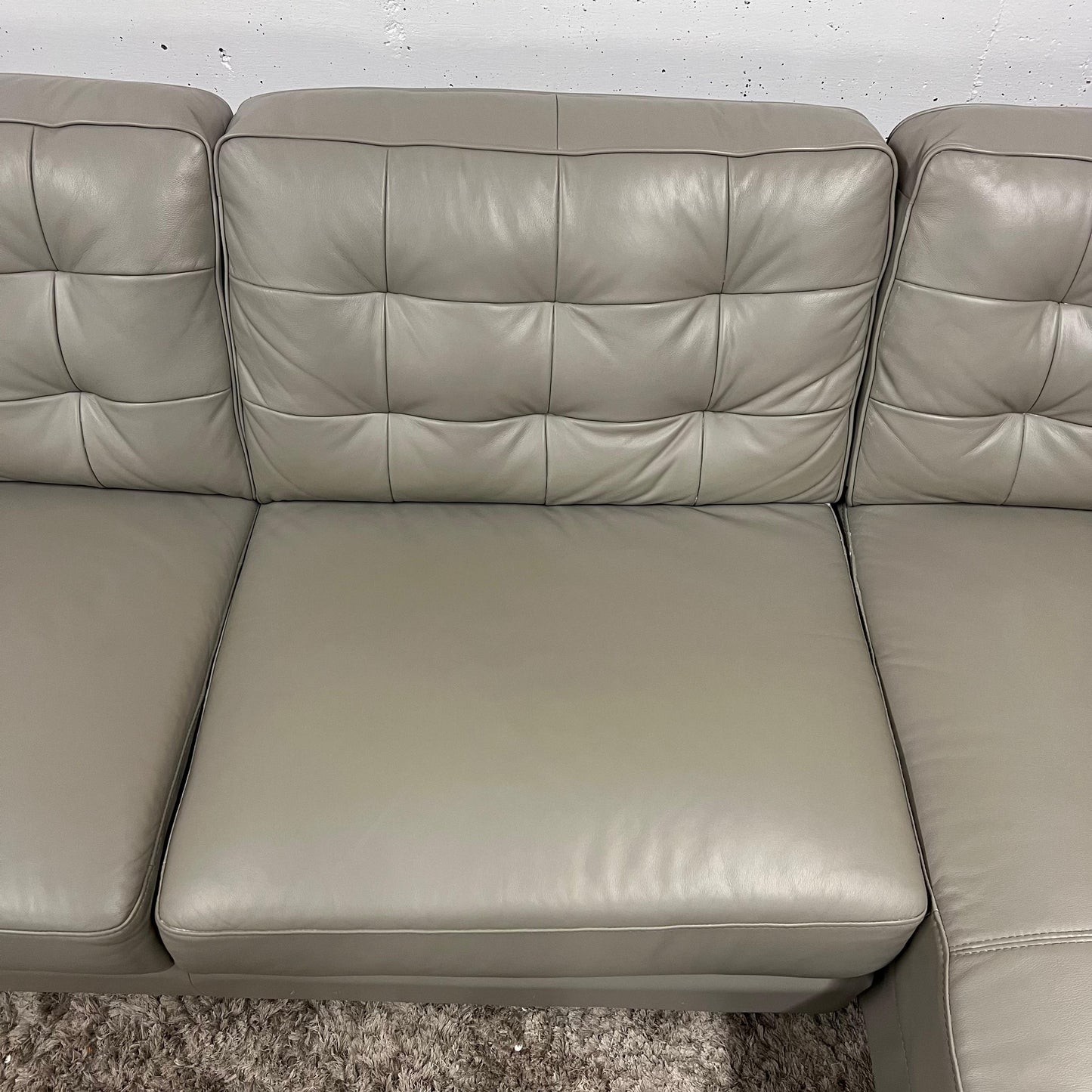 Amax leather sectional.