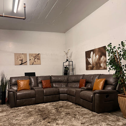 Leather reclining sectional. Power recliners